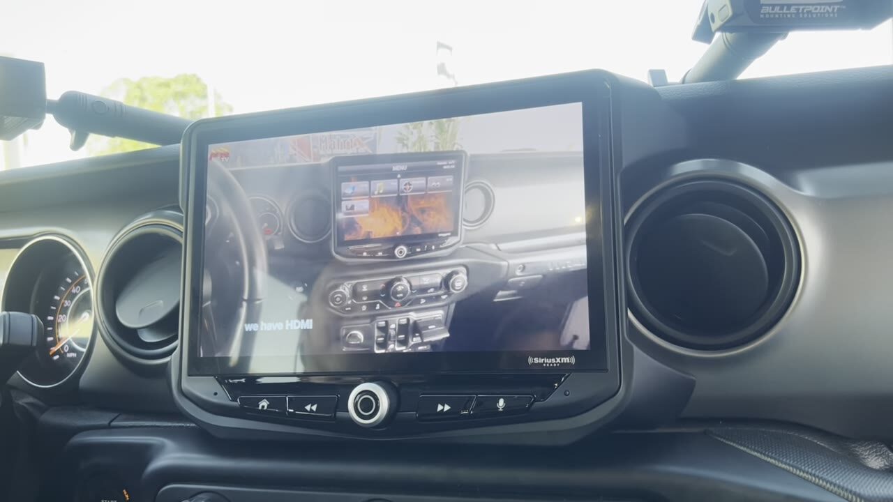 Audio MotorSports install of a Stinger HEIGH10 in a Jeep Wrangler, dash view.